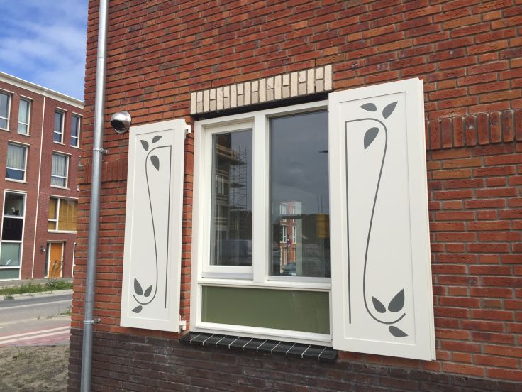 Speciale decoratie op paneelluiken.  Photo