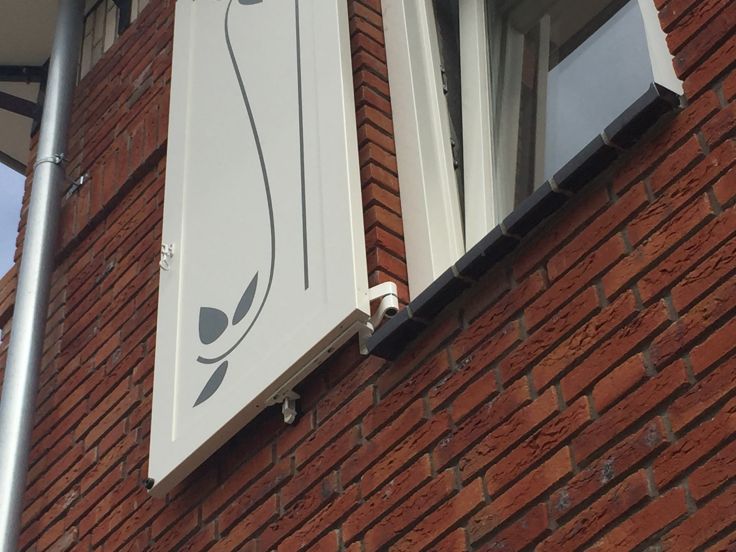 Speciale decoratie op paneelluiken.  Photo
